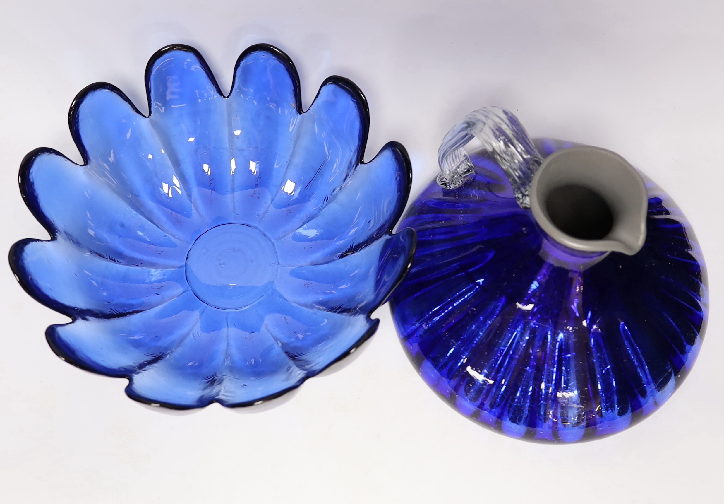 A group of glassware including Small Tiffany vase, two Baccarat dishes and a large blue glass fruit bowl, largest 28cm in diameter